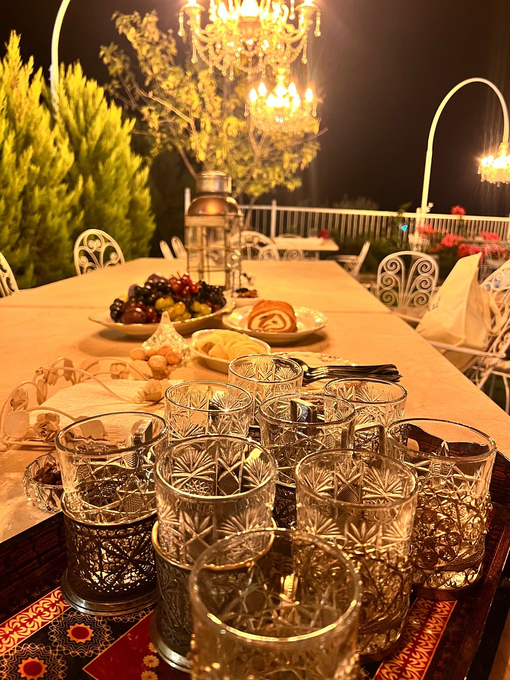 A private evening table set with crystal glasses at Chef’s Atolye